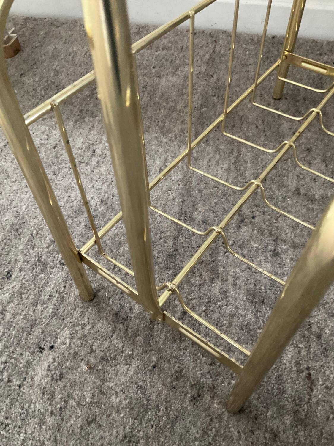 Vintage magazine holder in gold metal