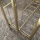 Vintage magazine holder in gold metal