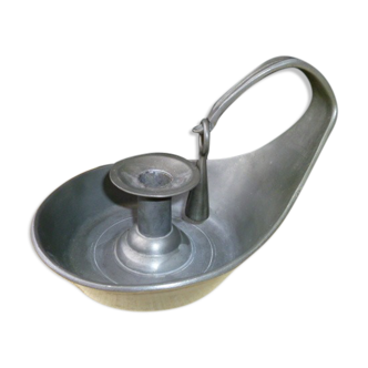 Cellar rat candle holder and its tin extinguisher.