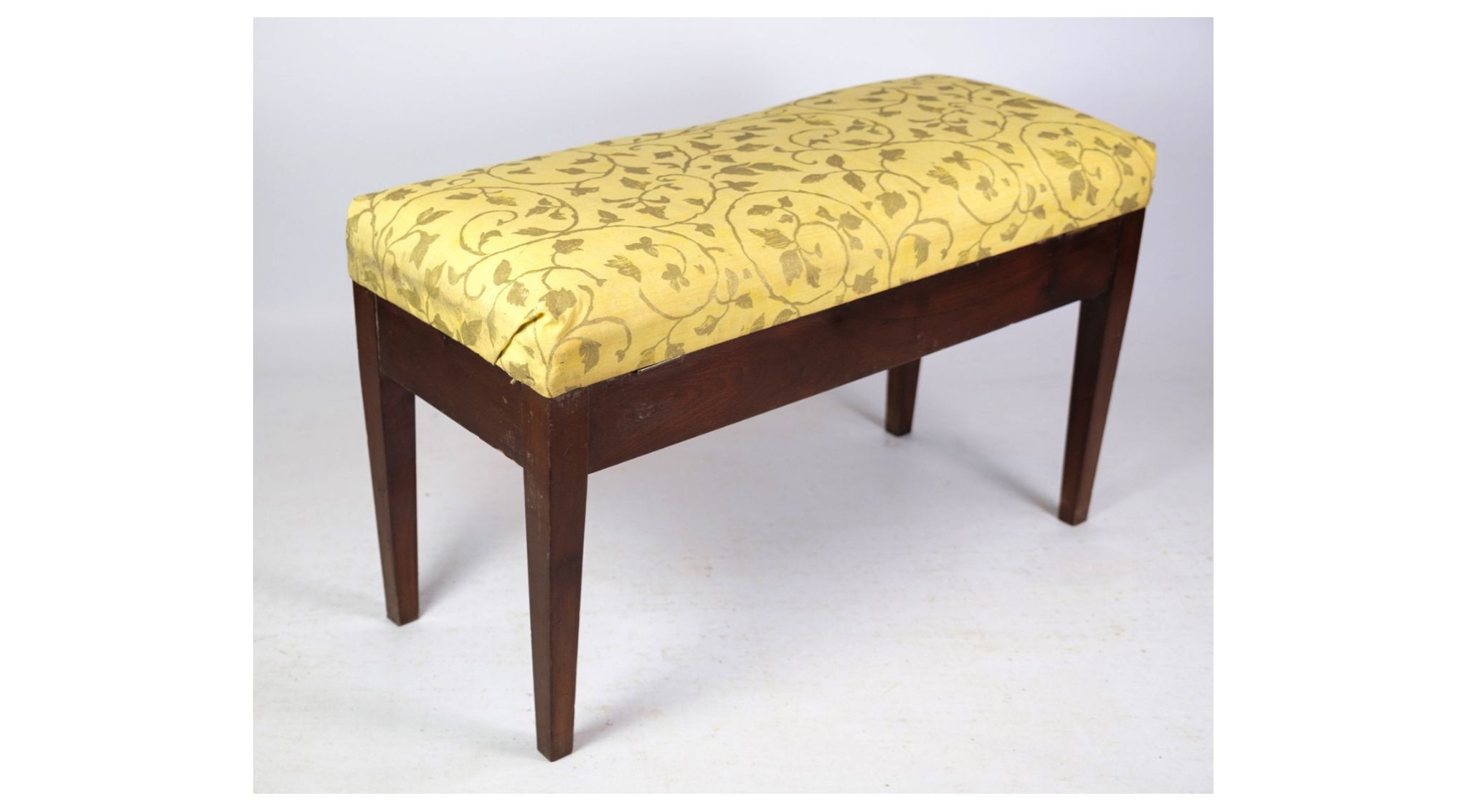 Piano bench / stool in mahogany with light floral fabric from around 1910