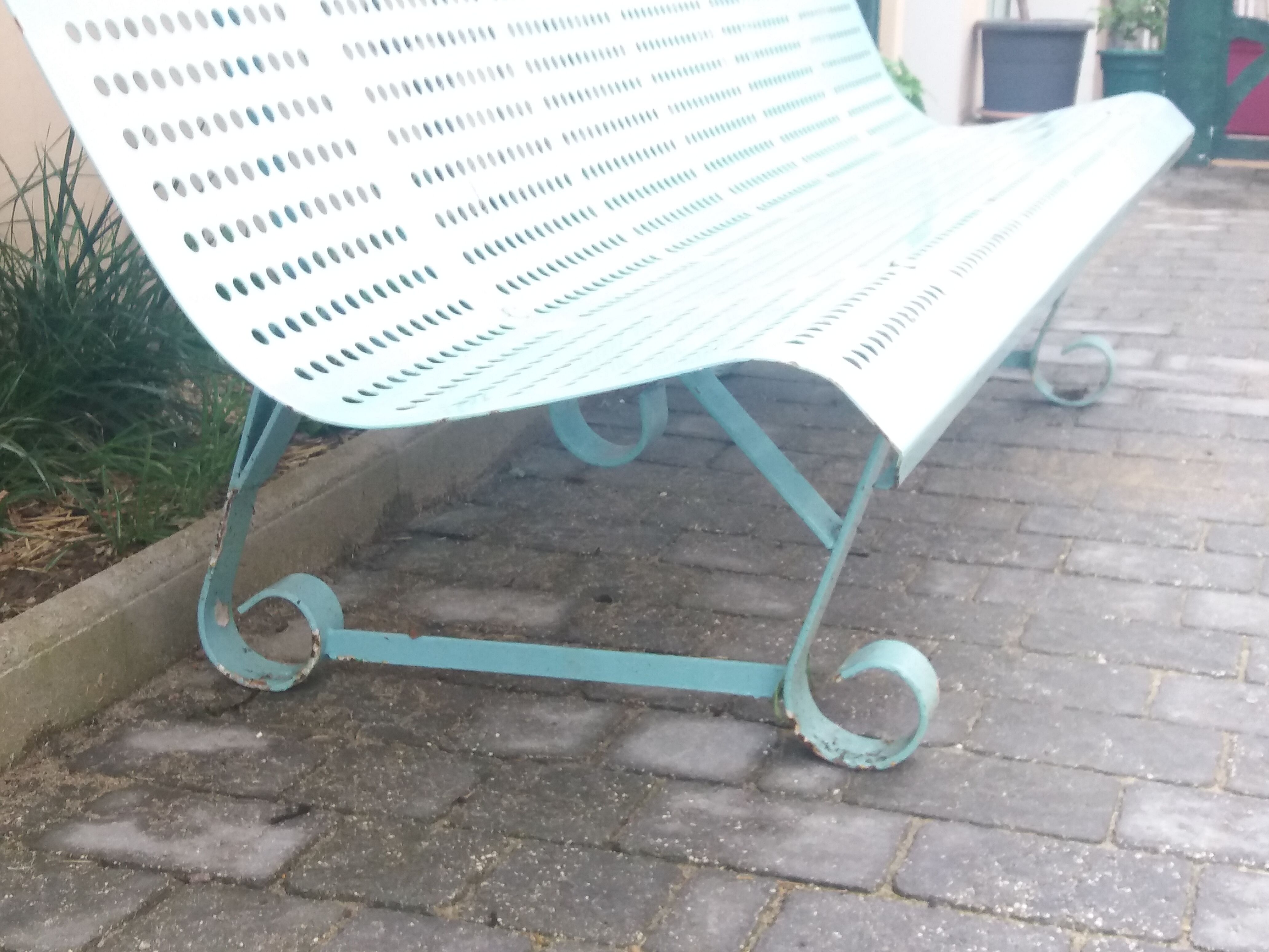 Vintage garden bench in metal