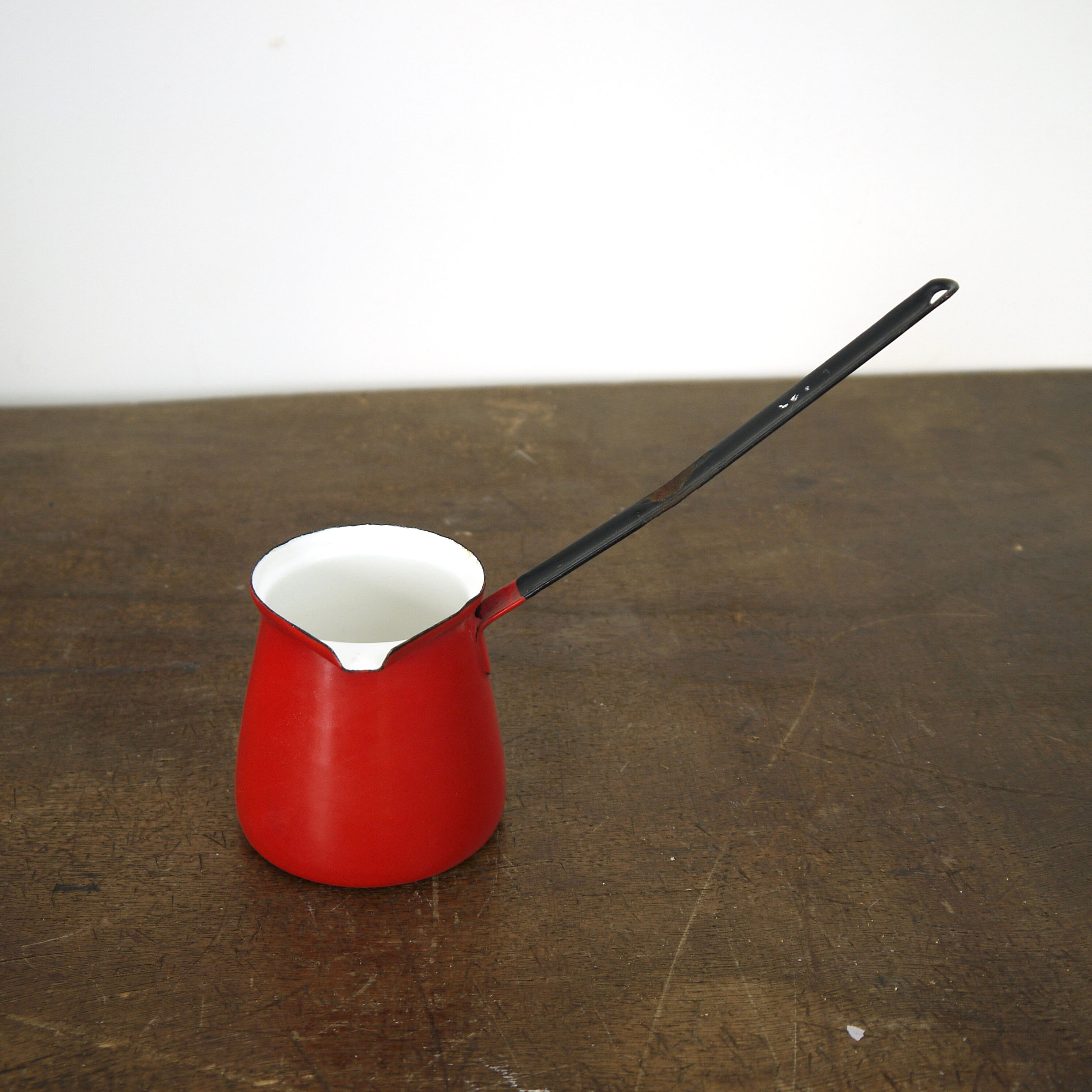 Turkish coffee maker in red enamel