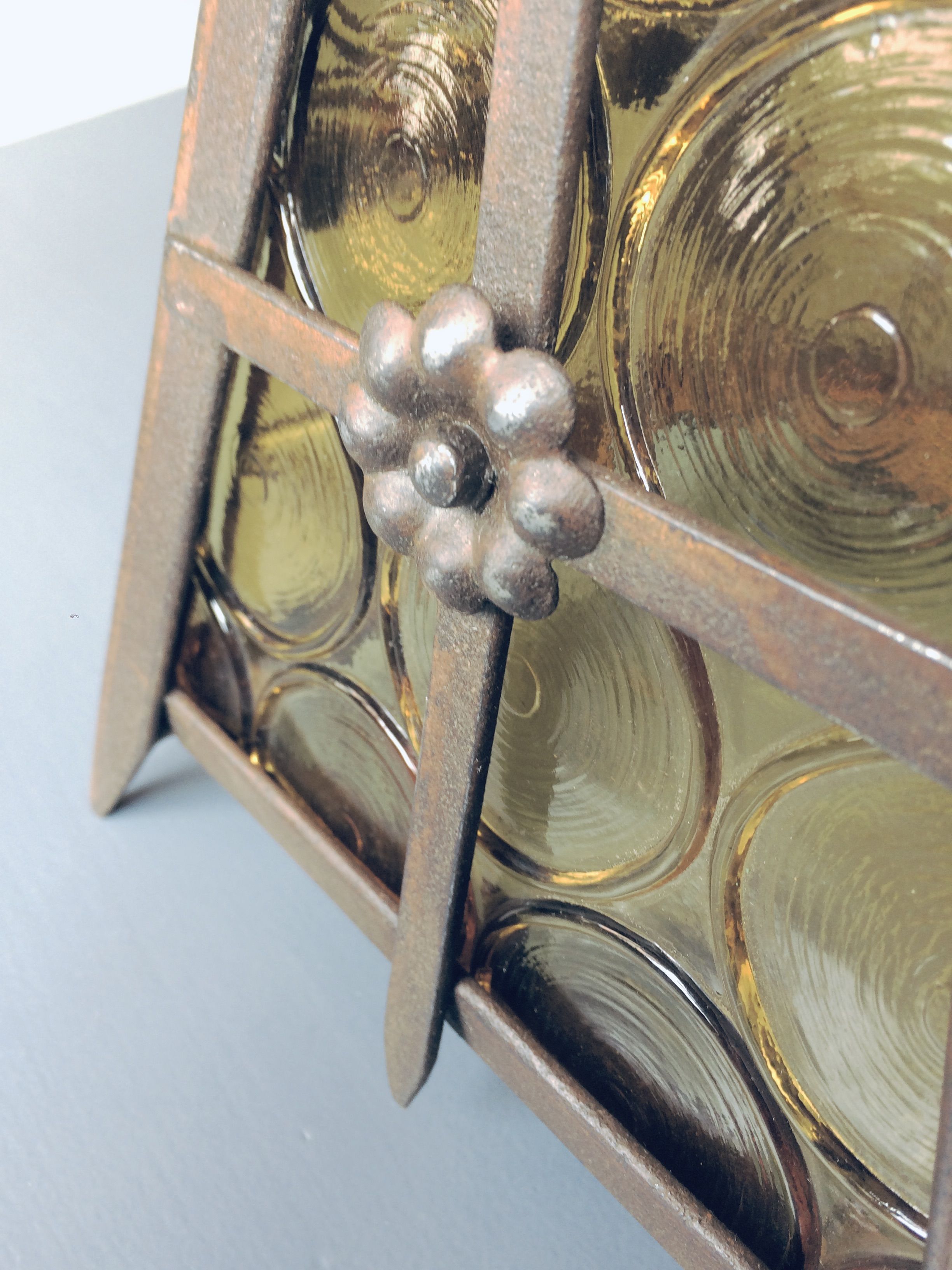 Old solid steel hanging and round-ornamented yellow glazing