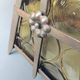 Old solid steel hanging and round-ornamented yellow glazing