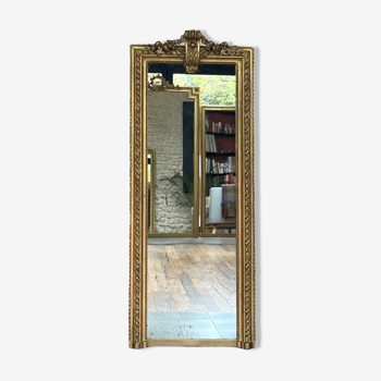 Miroir ancien 163cm/66cm d’entre deux doré à la feuille d’or l’époque fin 19ème, glace piquée, parqueté au dos.