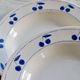 4 vintage deep plates in ivory earthenware with blue cherries