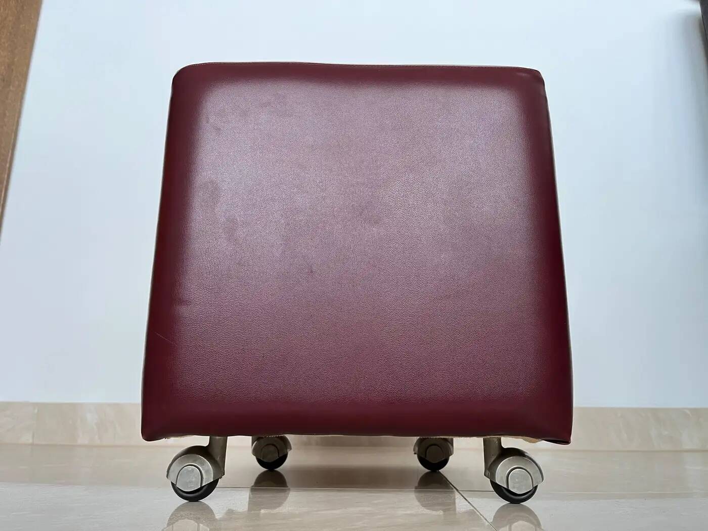 Pair of midcentury design wheel stools or tabourets, artificial leather, 1970s