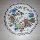 Decorative ceramic bird and cornucopia plate