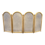 Antique brass fireplace screen from 1920, vintage spark guard.