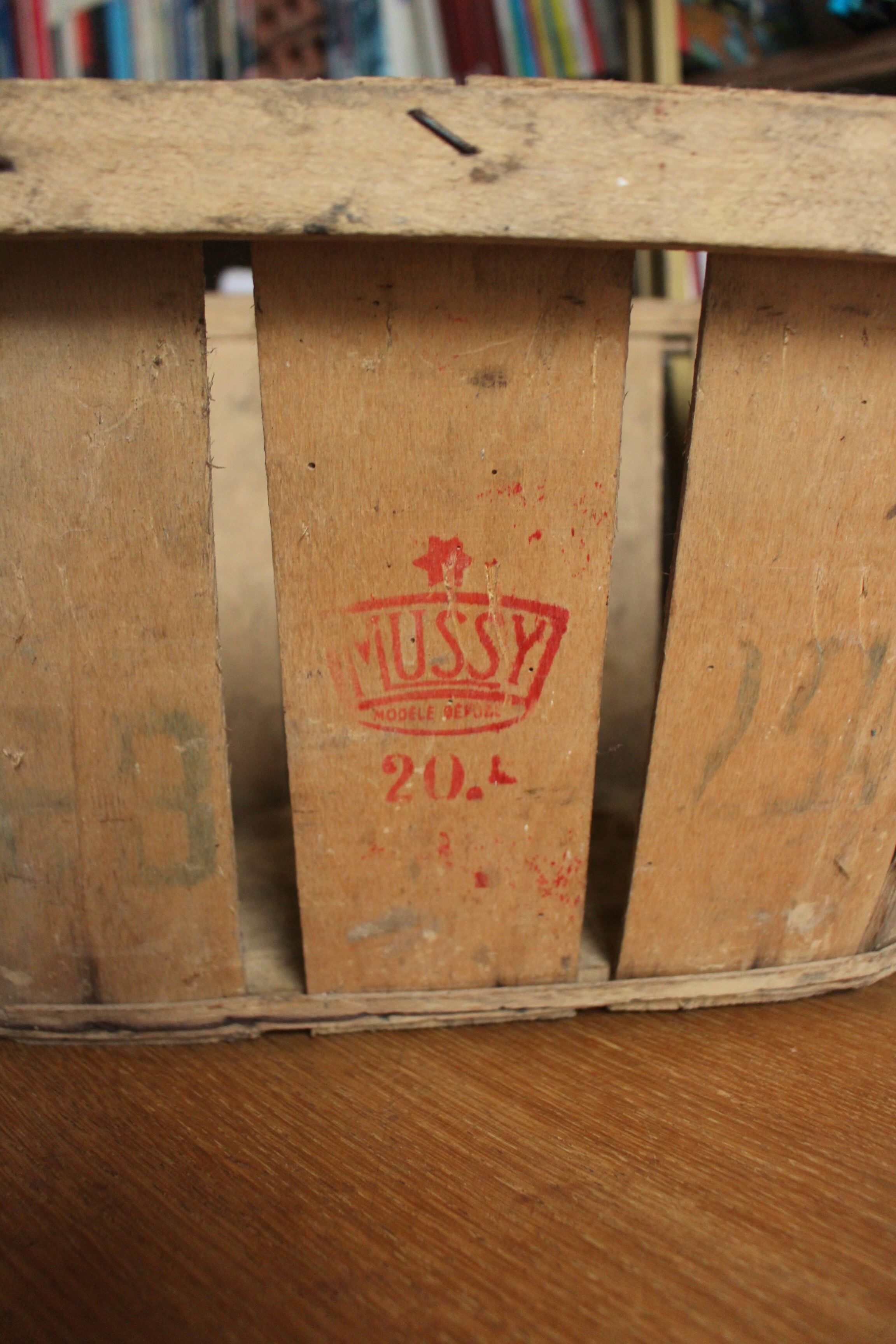 Wooden crate with slats strapping stamp mussy red storage