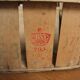 Wooden crate with slats strapping stamp mussy red storage