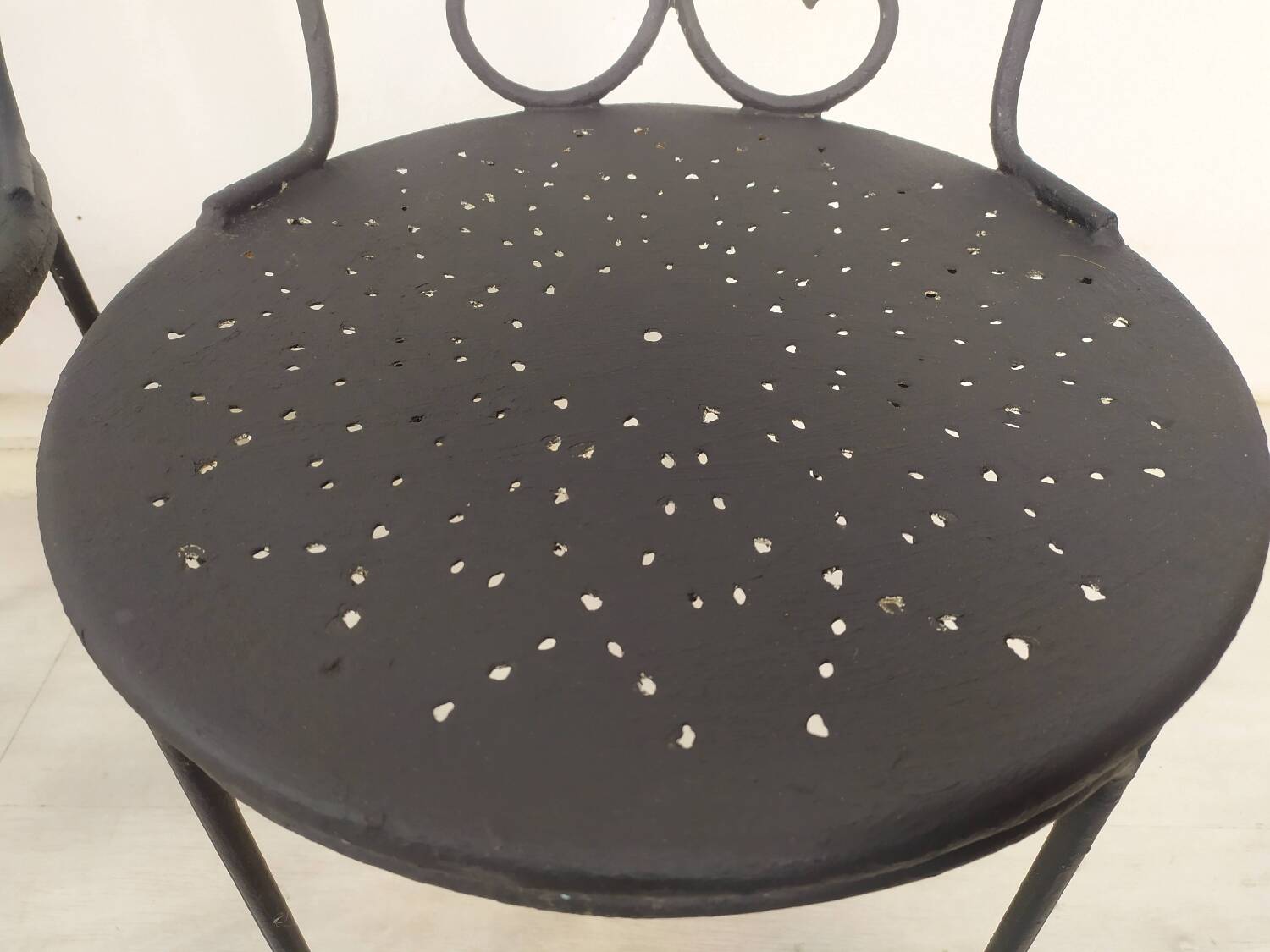 4 black garden chairs