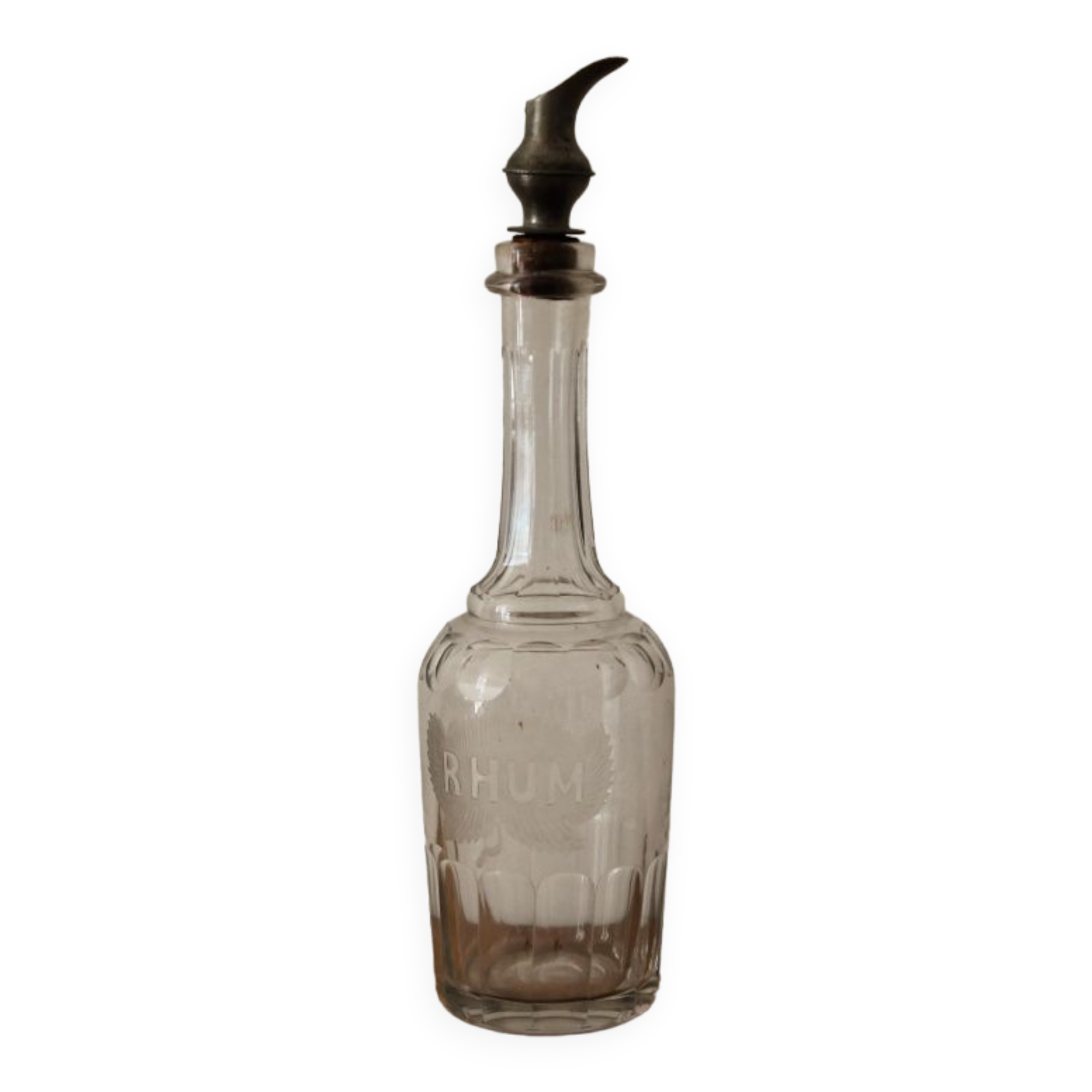 Chiseled glass rum bottle