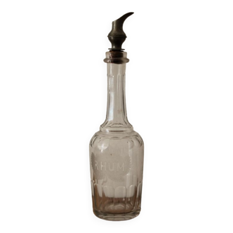 Chiseled glass rum bottle