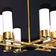 Set of three brass and opaline sconces, mid-century France