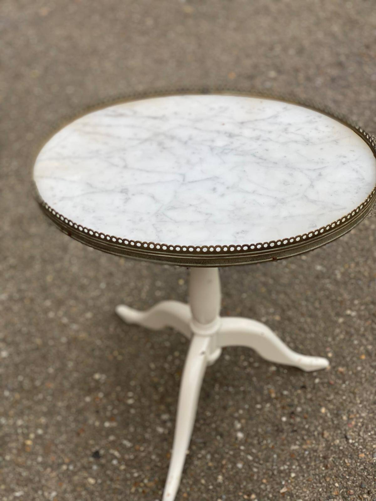 Pair of marble and ivory tripod pedestal tables