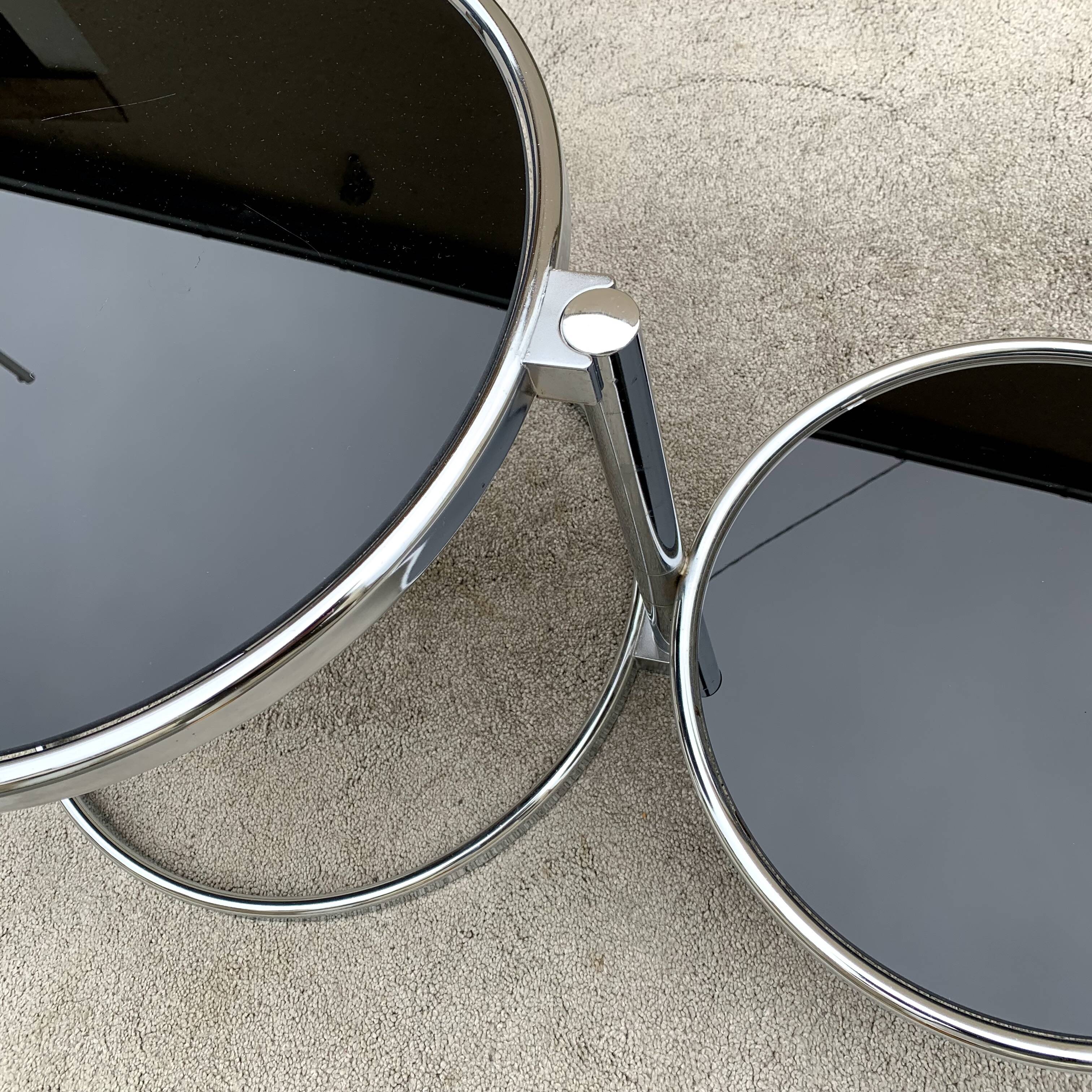 Articulated coffee table with 3 shelves, black glass and chrome, 1980