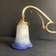 Art Nouveau wall light in gilded brass and glass paste tulip