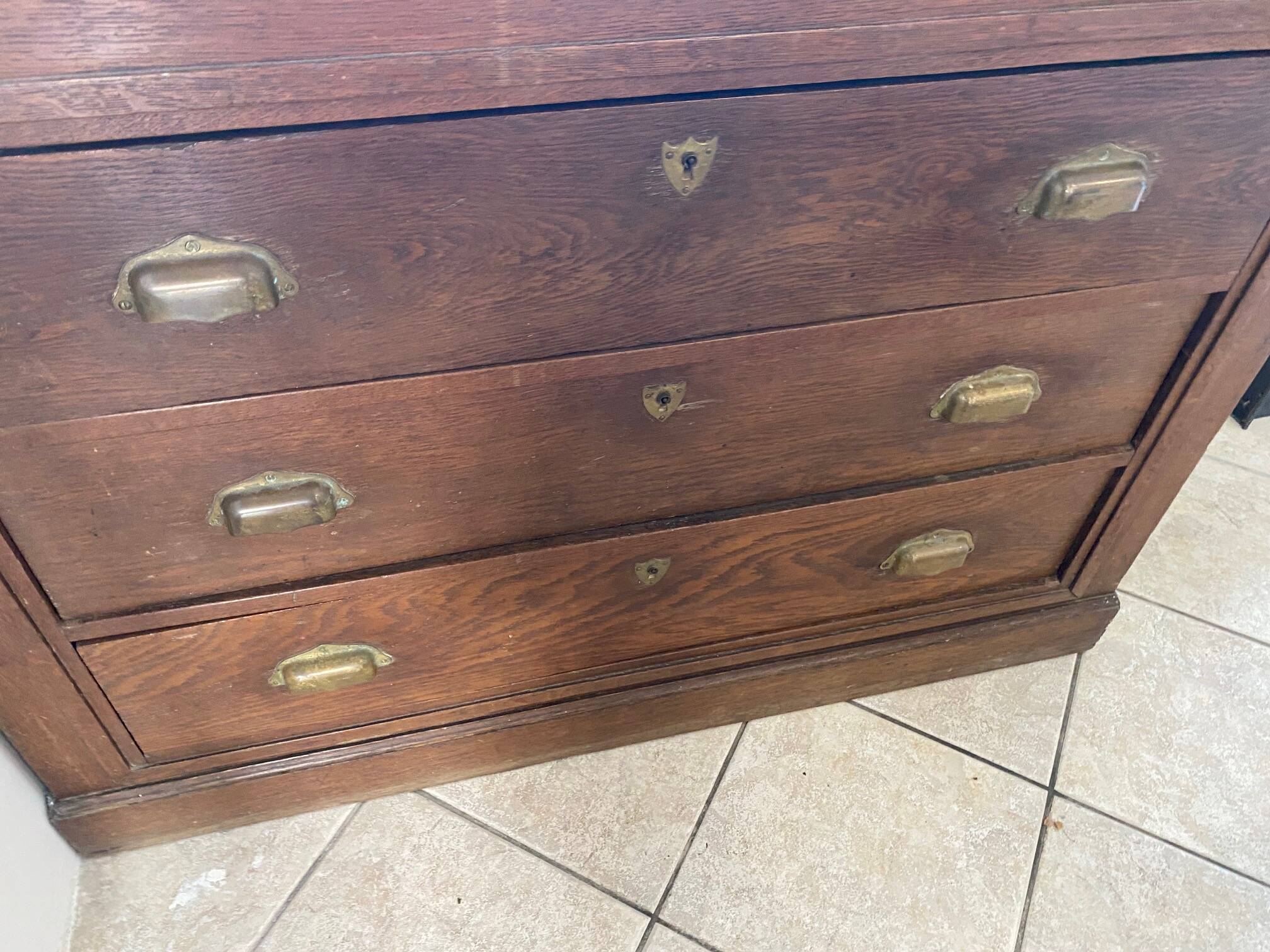Old and authentic workshop counter with 3 large oak drawers.