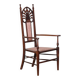 English armchair attributed to J.S. Henry, late 19th century.