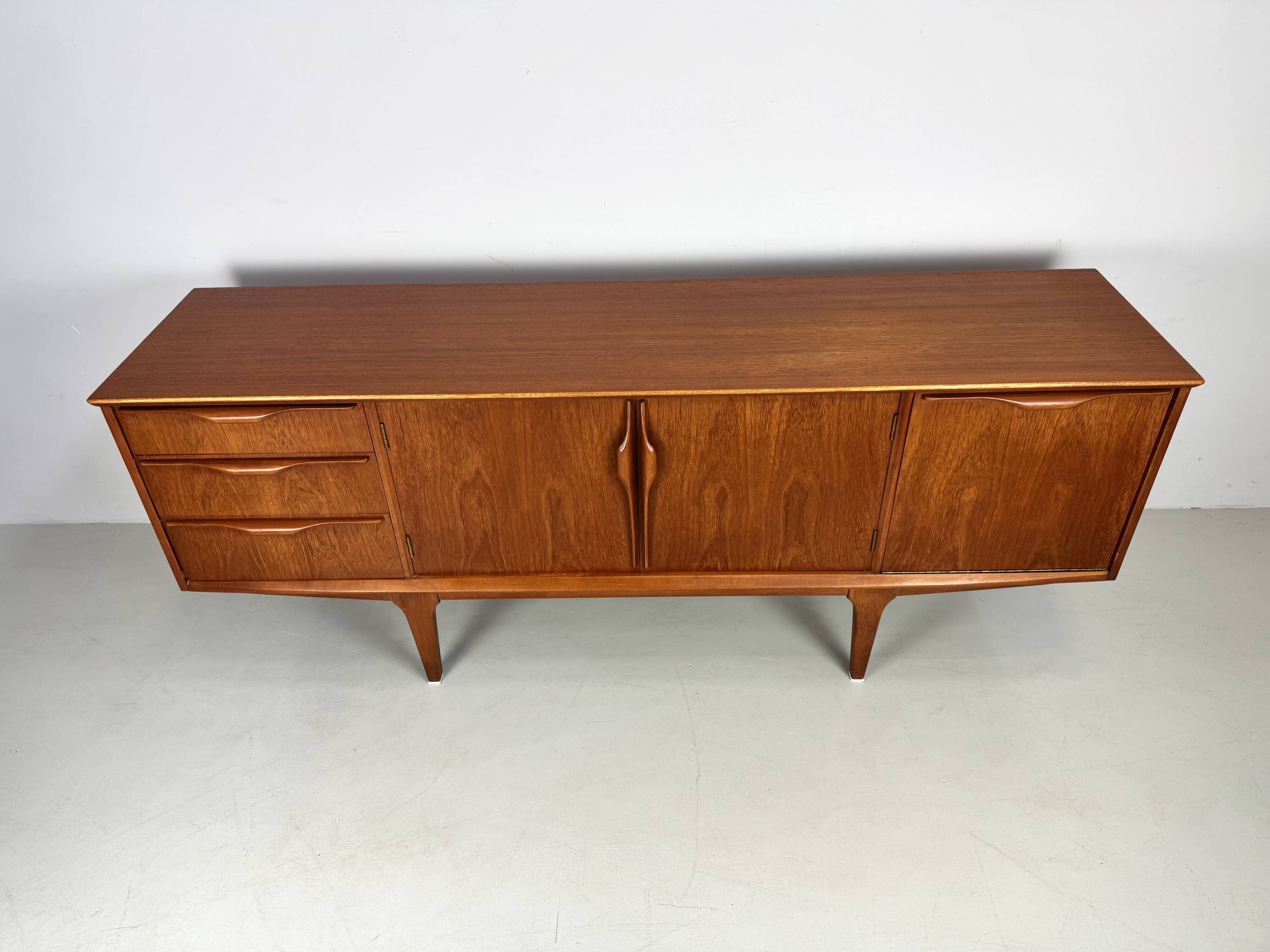 Vintage sideboard by Jentique from the 1960s .