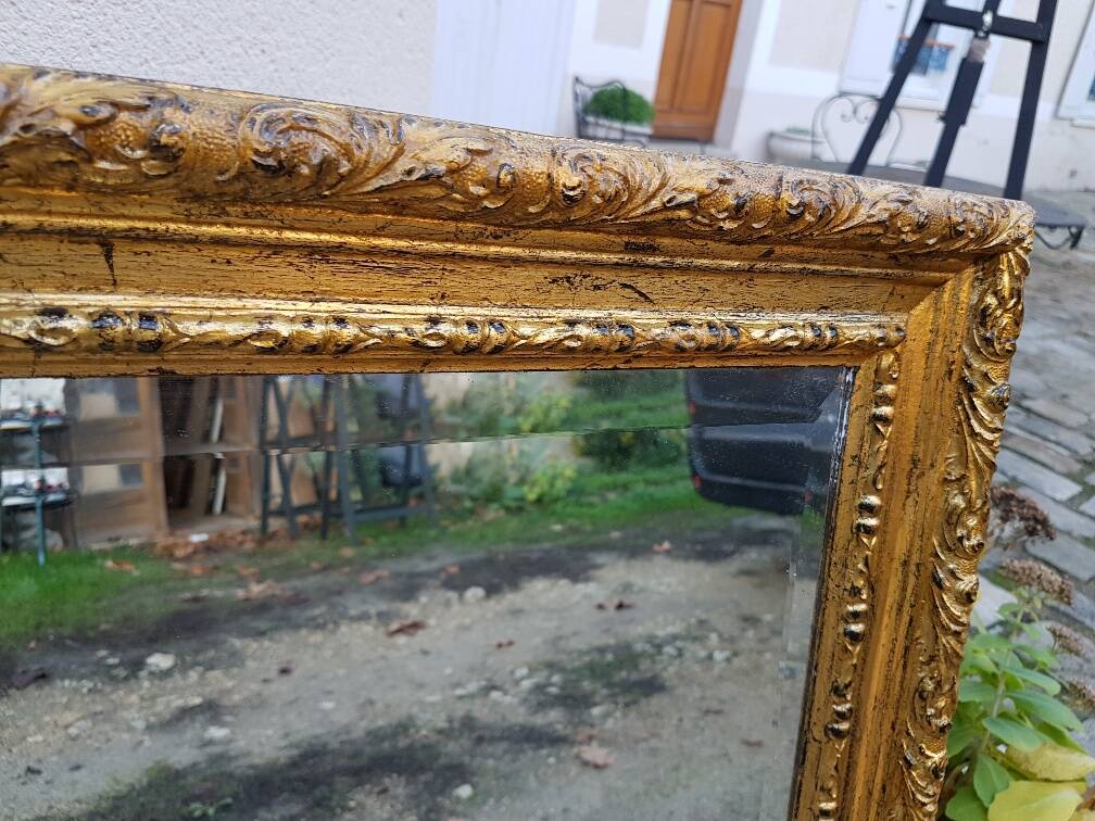 Grand golden mirror in louis xvi style