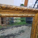 Grand golden mirror in louis xvi style