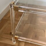 2 side tables in plexiglass, glass, and brass.