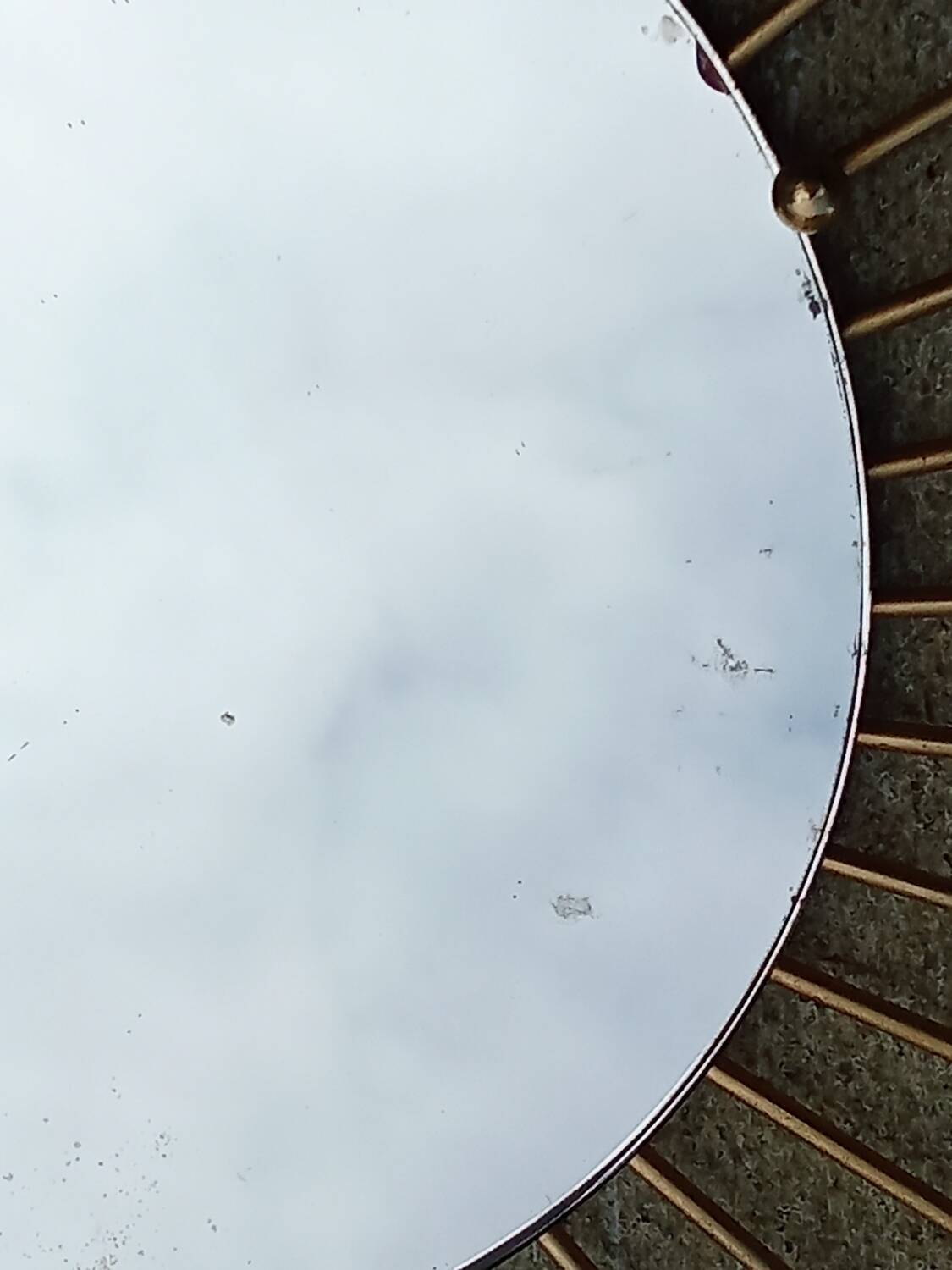 Miroir soleil métal doré