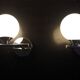 Pair of sconces with an opaline globe and chrome structure from the 1970s