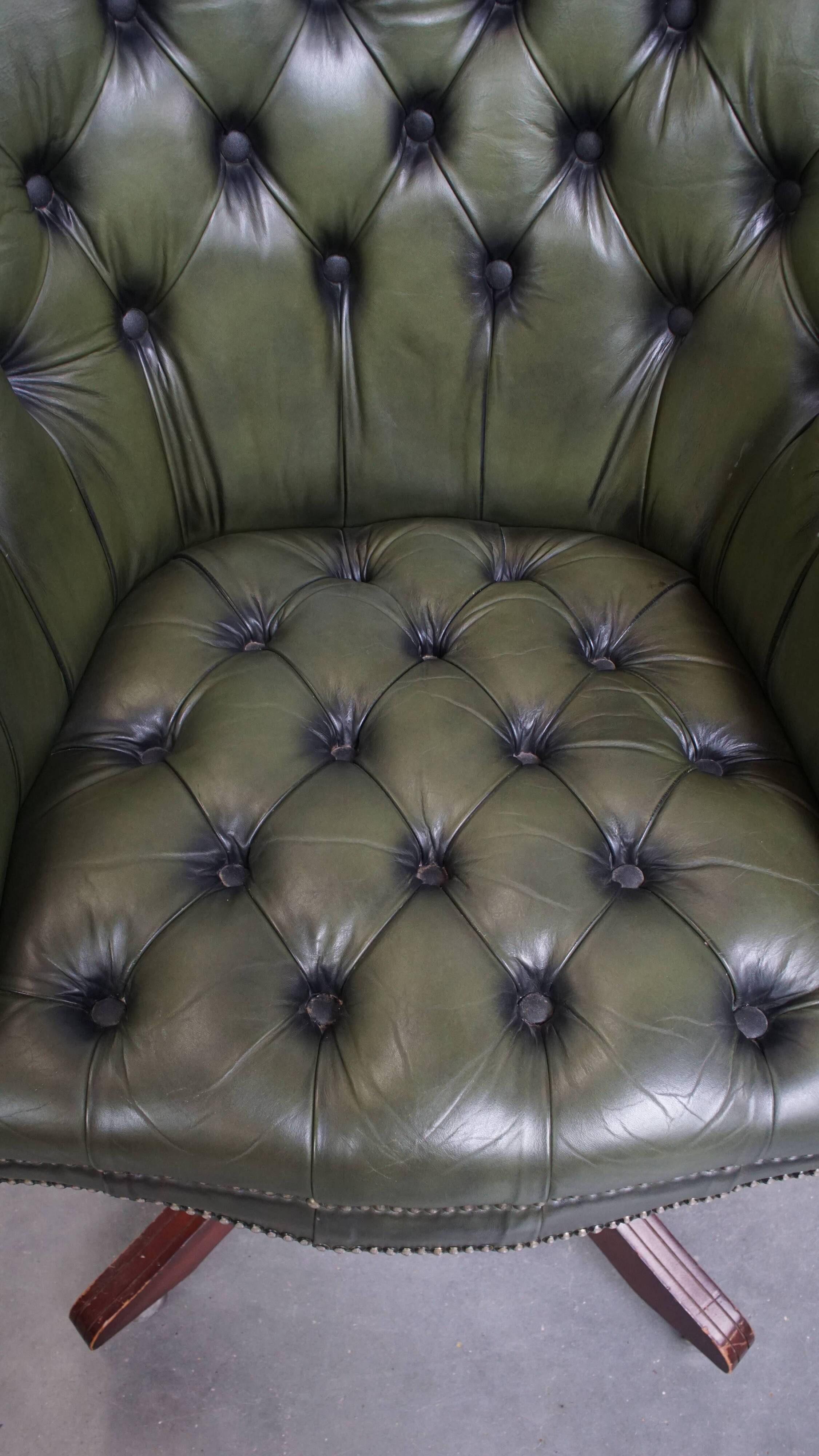 Chesterfield office chair in green cowhide leather on casters with high back