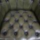 Chesterfield office chair in green cowhide leather on casters with high back