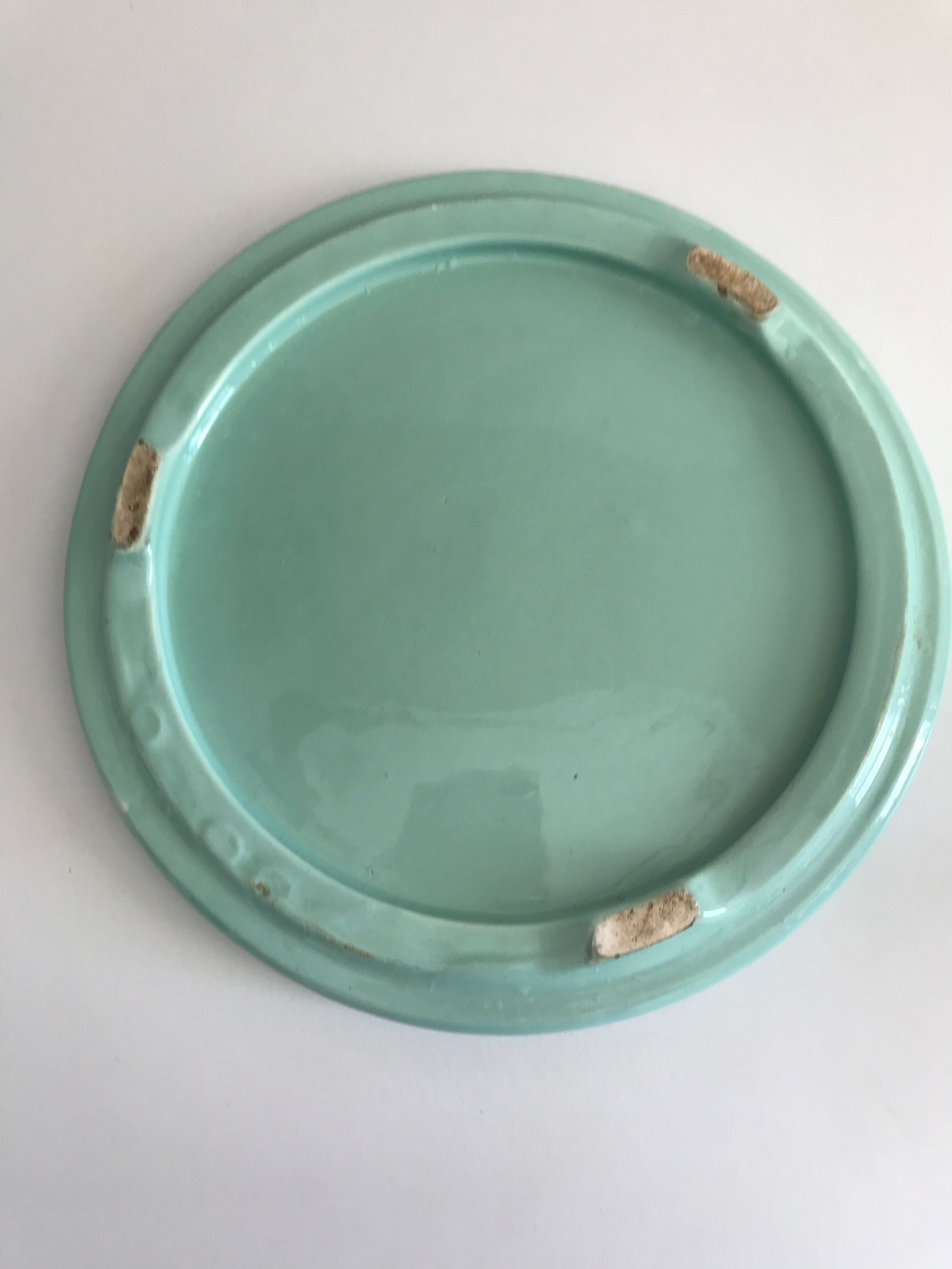 Mint green earthenware underside
