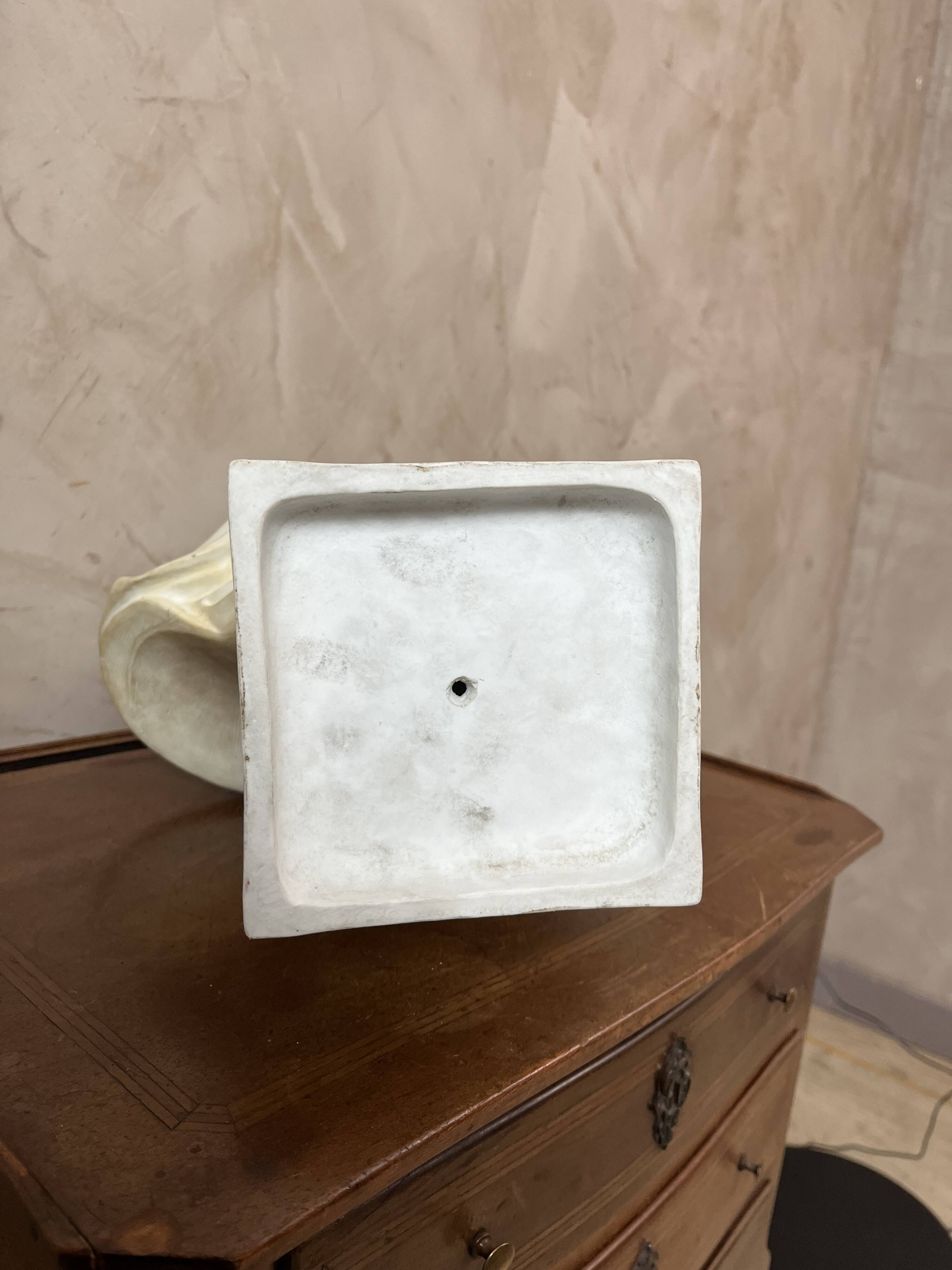 Bust of a woman in Biscuit signed