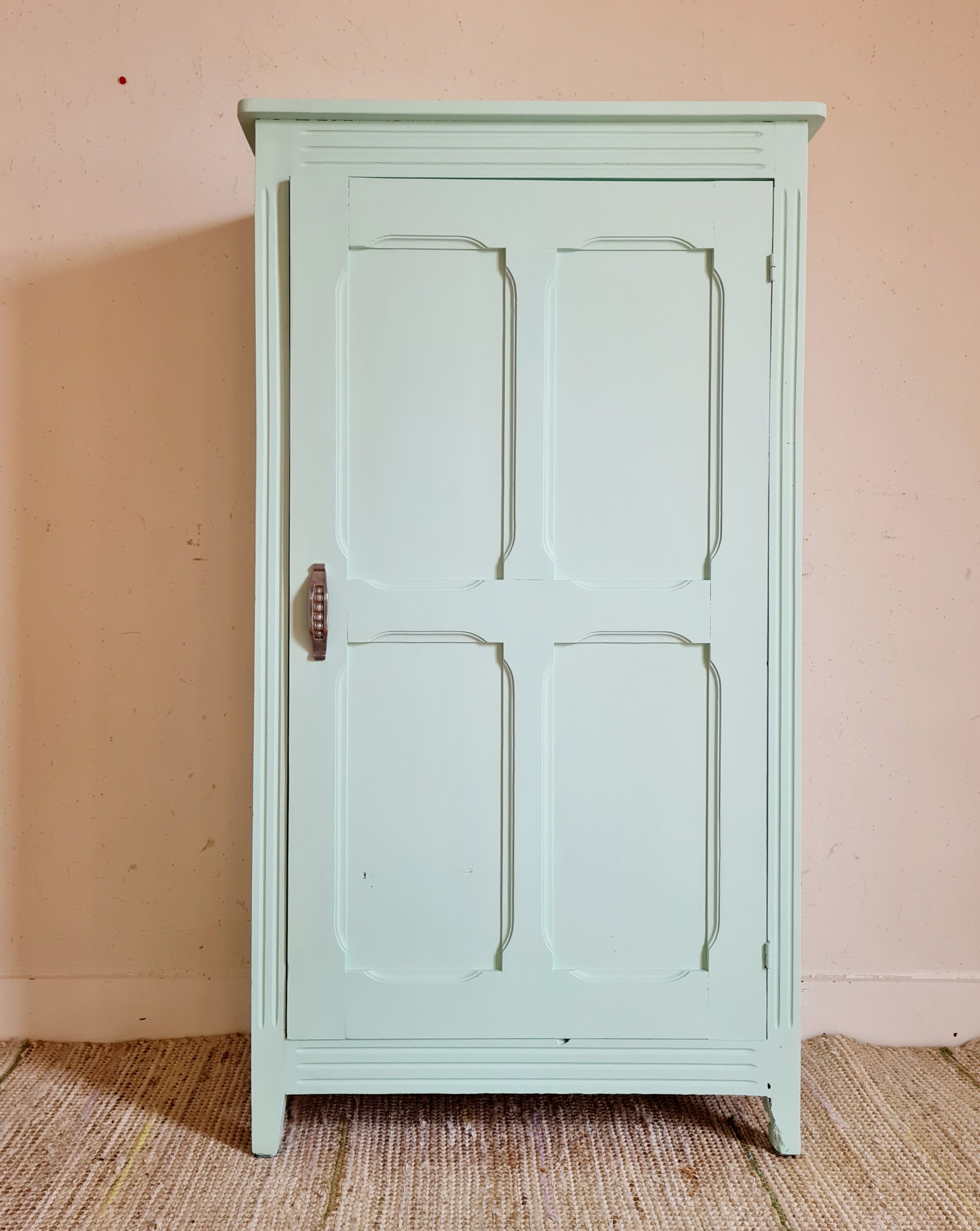 Parisian wardrobe small format soft green interior terracotta