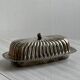 Old English butter dish in silver-plated metal and chiseled crystal.