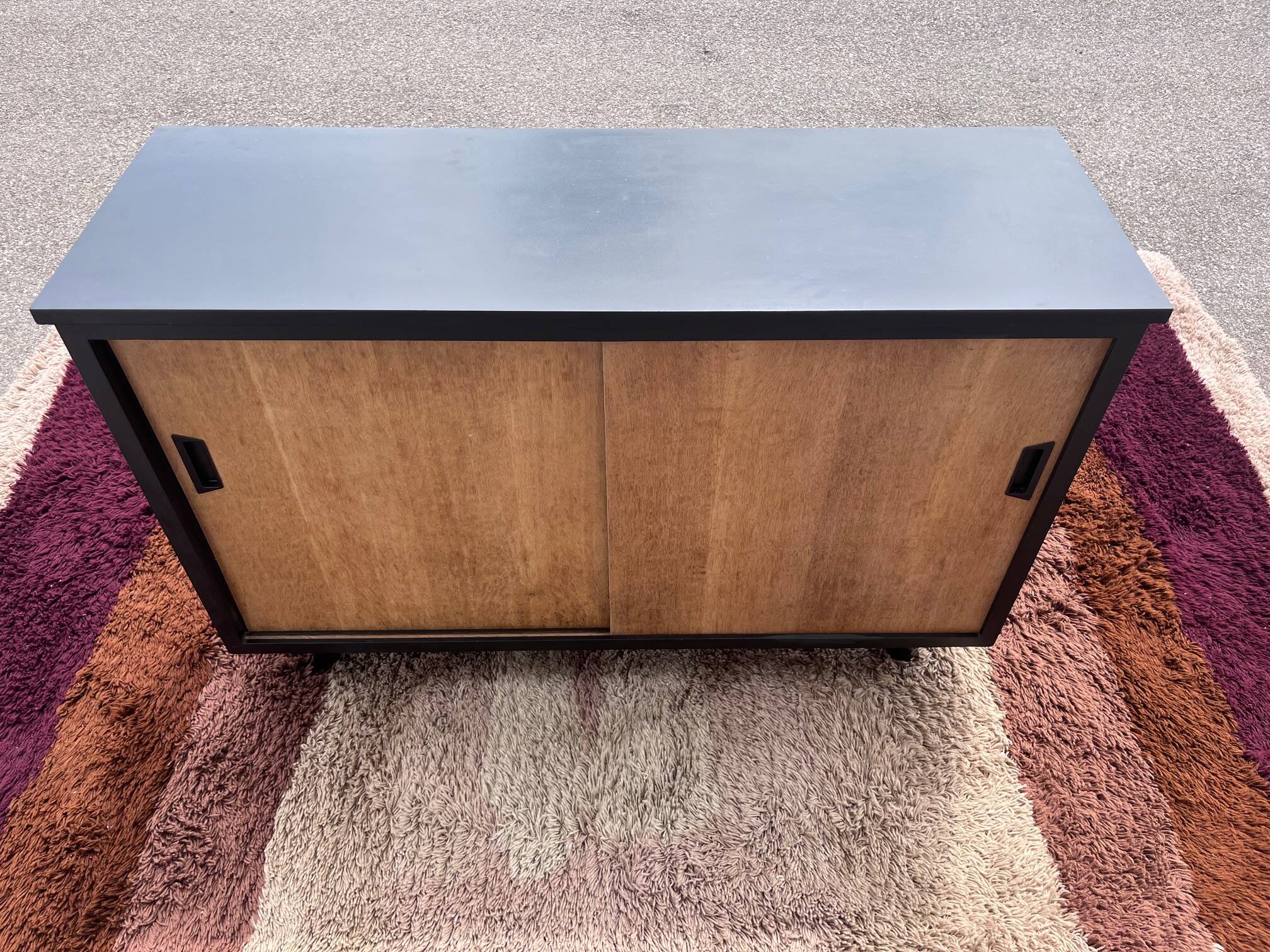 black and wood two-door sideboard