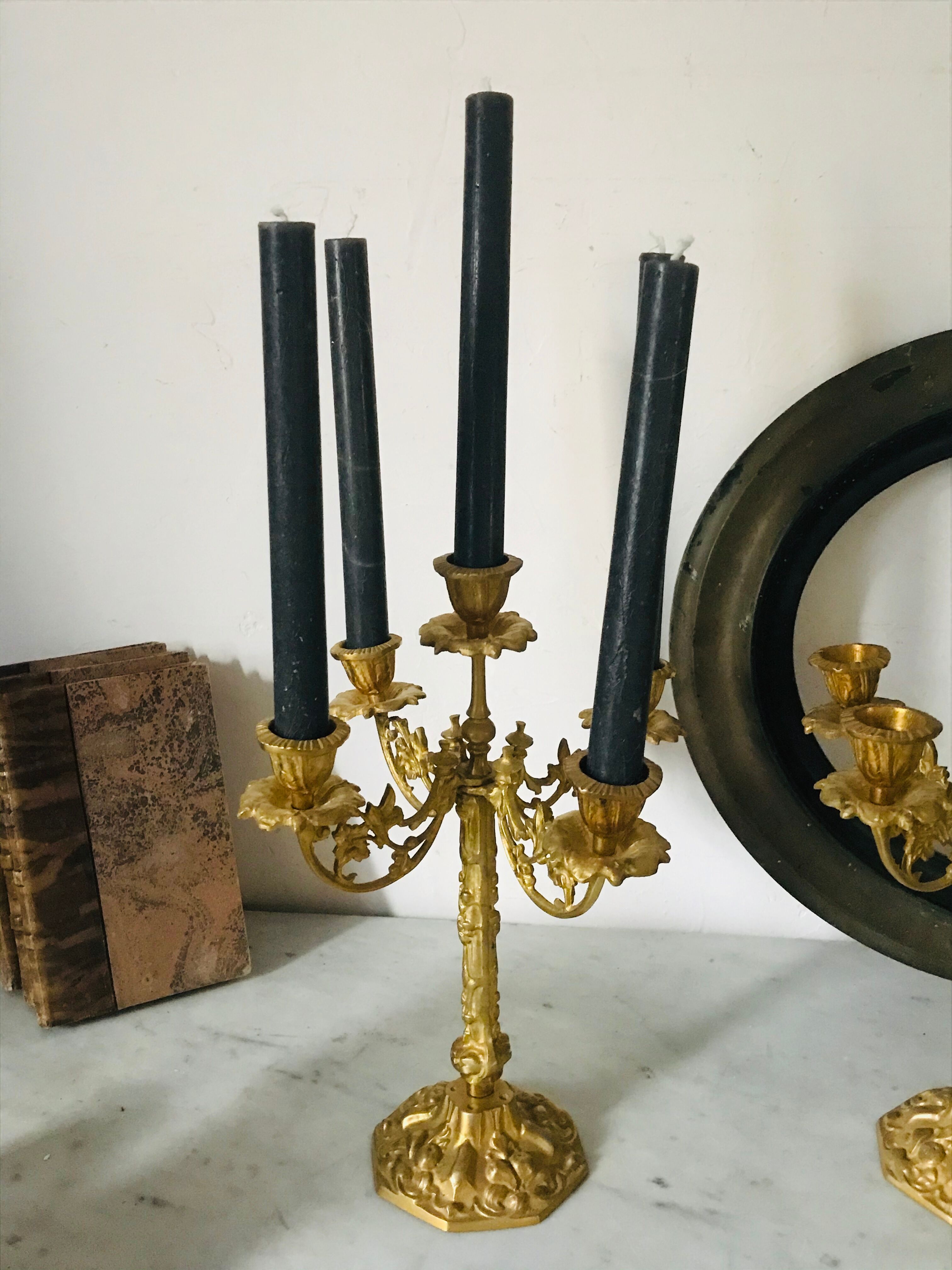 Pair of golden brass candlesticks
