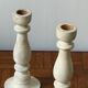 Pair of white wooden candlesticks