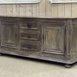 Enfilade of the eighteenth century in oak, top false marble