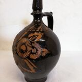 Jug in varnished sandstone
