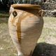 Ancient terracotta pottery jar