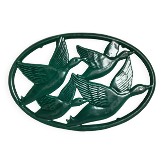 Zoomorphic enameled cast iron trivet
