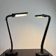 Pair of black articulated desk lamps — Ledu