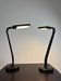 Pair of black articulated desk lamps — Ledu