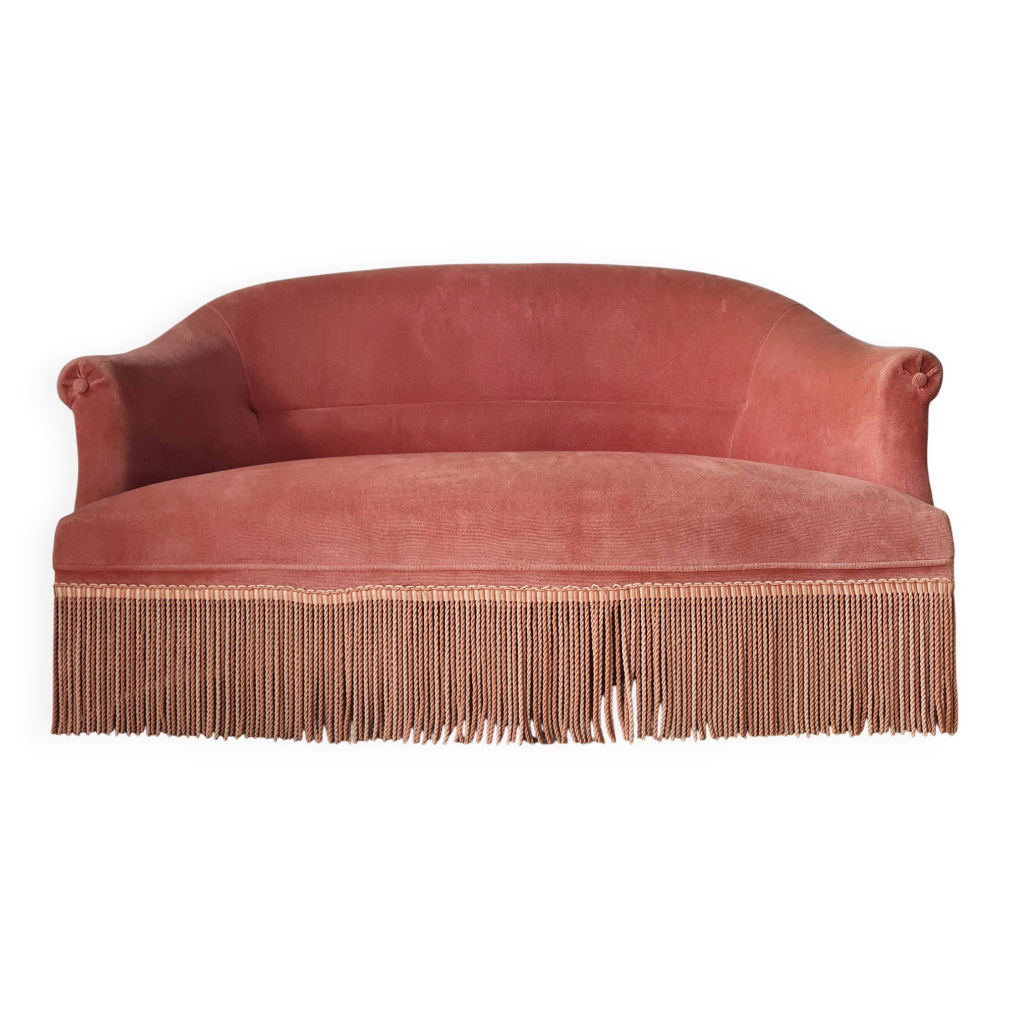 Banquette crapaud en velours rose avec franges
