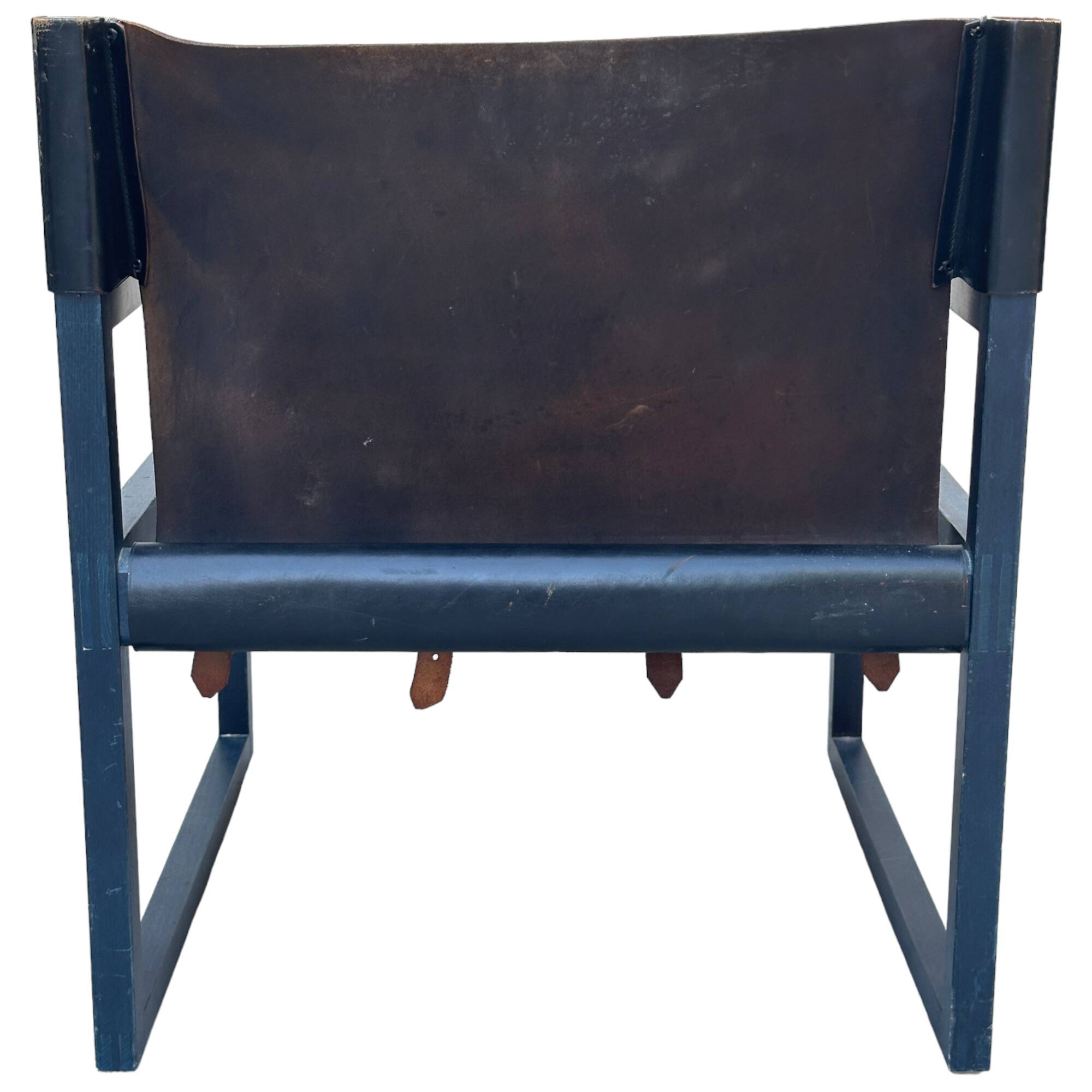 Postmodern lounge chair in black saddle leather and midnight blue wood, 1980.