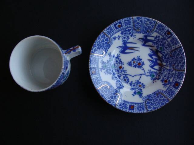 Asian Swallow Cup and Saucer