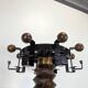 Oak and hammered iron press screw coat rack