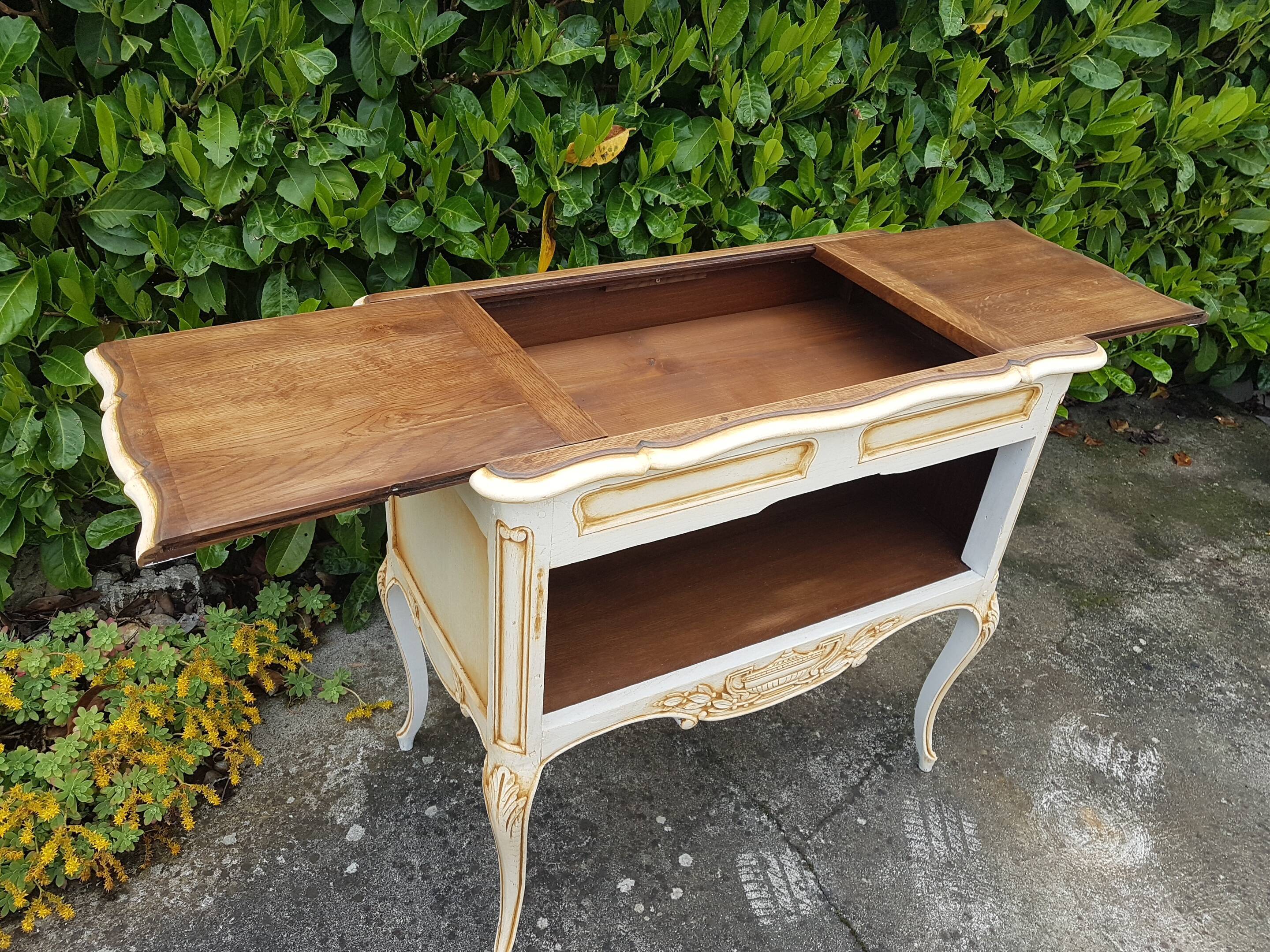 Extra furniture with an opening tray